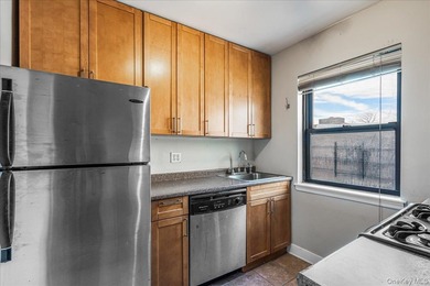 Welcome to this charming top-floor, one-bedroom walk-up located - photo 6