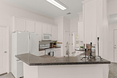 WATERFRONT...Tucked along one of the area's canal-front streets - photo 17