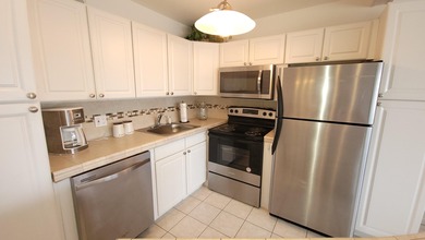 Gorgeous, updated condo on the top level of this four-story