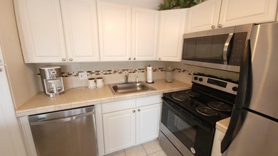 Gorgeous, updated condo on the top level of this four-story