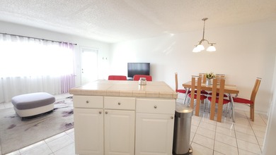 Gorgeous, updated condo on the top level of this four-story