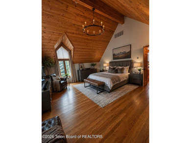 Nestled within Teton Pines, this exceptional Cluster Home offers - photo 8