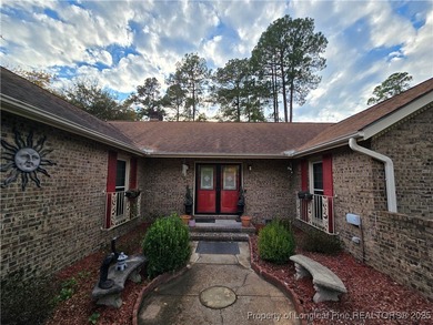 Take a look at this stunning all brick home designed with full