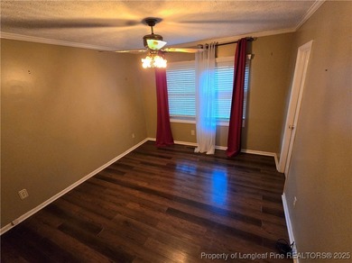 Take a look at this stunning all brick home designed with full