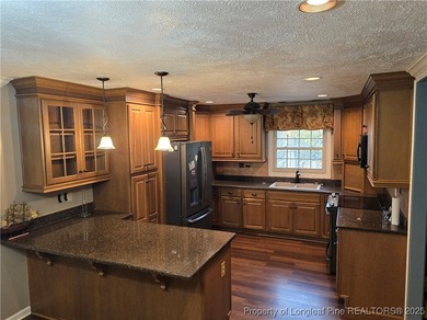 Take a look at this stunning all brick home designed with full