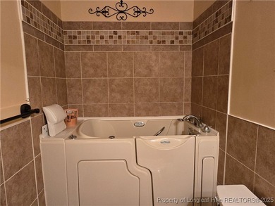 Take a look at this stunning all brick home designed with full