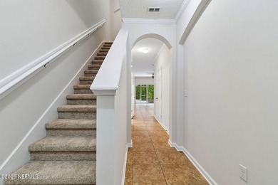 Welcome home to this beautifully updated townhome in the gated - photo 3