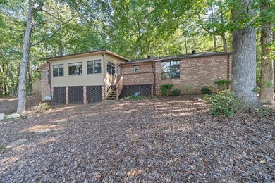 Lakefront Escape with Endless Possibilities. This home is set on - photo 2