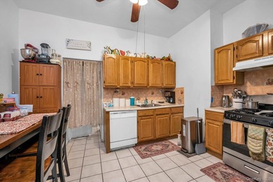 Welcome to this well maintained and updated 2-unit brick home - photo 5