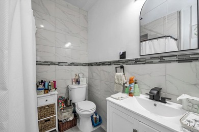 Welcome to this well maintained and updated 2-unit brick home - photo 6