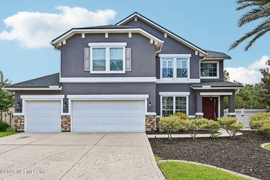 Located in St Johns County, this 4-bedroom, 3-bath home has 3 - photo 2