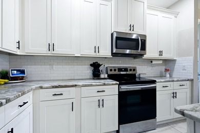 Built in 2019, this well maintained 4-bedroom, 2-bath home with - photo 9