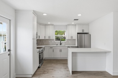 Completely renovated and full of charm, this beautiful 3-bedroom - photo 8