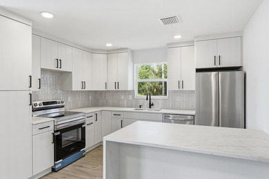 Completely renovated and full of charm, this beautiful 3-bedroom - photo 9