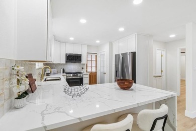 Rare opportunity to own a fully remodeled property in the heart - photo 12