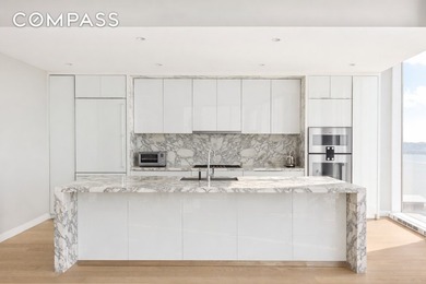 This elegant three-bedroom, three-and-a-half-bath home at One - photo 2