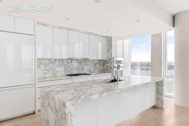 This elegant three-bedroom, three-and-a-half-bath home at One - photo 3
