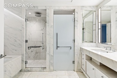 This elegant three-bedroom, three-and-a-half-bath home at One - photo 7