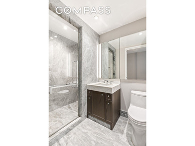 This elegant three-bedroom, three-and-a-half-bath home at One - photo 8