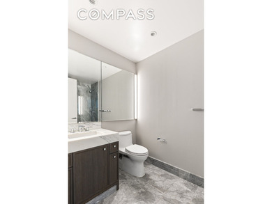 This elegant three-bedroom, three-and-a-half-bath home at One - photo 9