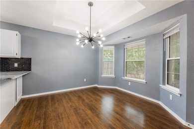 Tucked beneath a mature hardwood canopy in an established - photo 9