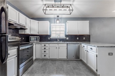 Tucked beneath a mature hardwood canopy in an established - photo 10