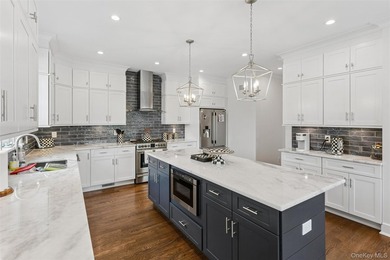 Welcome to this stunning waterfront Colonial, built in 2022 and - photo 12