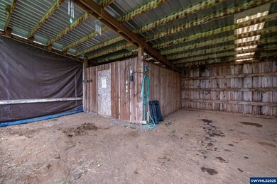 Set on 32.34 private acres, this true horse property features a - photo 35