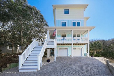 Perched high on one of the most elevated homesites on Topsail