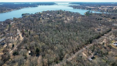 Nestled away from the water's edge of Cedar Creek Lake, this - Lake Acreage For Sale in Eustace, Texas