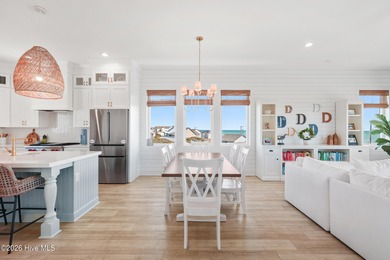 Perched high on one of the most elevated homesites on Topsail