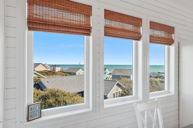 Perched high on one of the most elevated homesites on Topsail