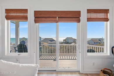 Perched high on one of the most elevated homesites on Topsail