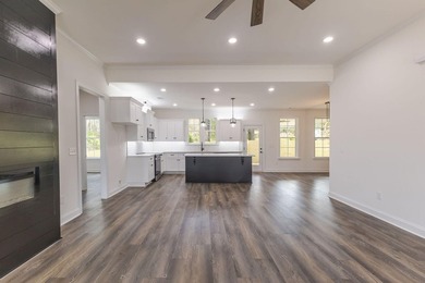 Stunning Ranch with High end finish with a starter price. Open