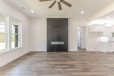 Stunning Ranch with High end finish with a starter price. Open