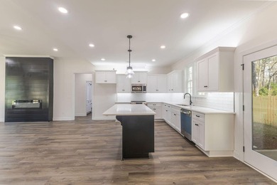 Stunning Ranch with High end finish with a starter price. Open