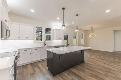 Stunning Ranch with High end finish with a starter price. Open