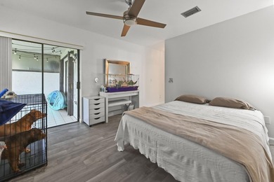 Welcome to 84 Conaskonk Circle in Royal Palm Beach, a bright and - photo 10