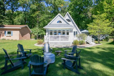 This charming three-bedroom, two-bath, 2,380-square-foot A-frame - Lake Home Sale Pending in Vandalia, Michigan