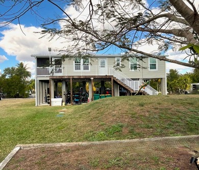 This 2023 stilt home sits on an oversized lot, offering over 250 - photo 6