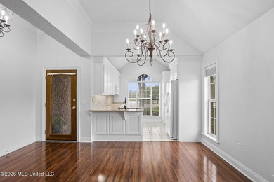 Move-in ready and absolutely immaculate. This charming 2-bedroom - photo 3