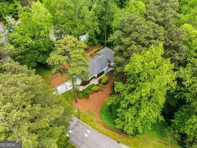 Nestled on a large 3/4+ acre serene, corner lot in the highly - photo 4