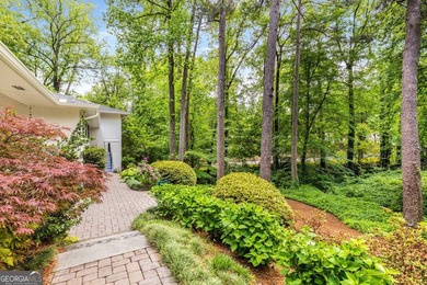 Nestled on a large 3/4+ acre serene, corner lot in the highly - photo 5