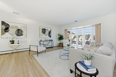 This well-appointed waterfront home blends timeless elegance - photo 3