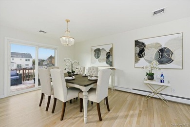 This well-appointed waterfront home blends timeless elegance - photo 6