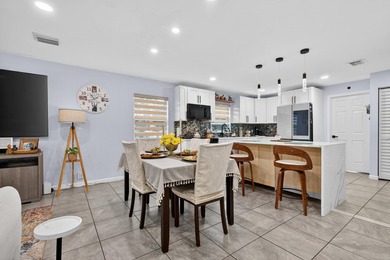 Beautifully remodeled 4-bedroom, 3-bathroom home featuring two - photo 12