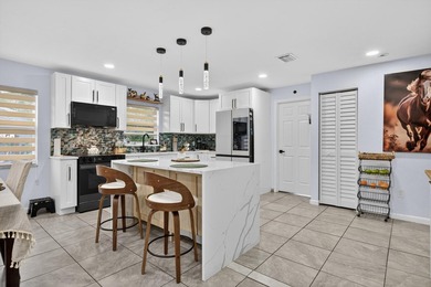 Beautifully remodeled 4-bedroom, 3-bathroom home featuring two - photo 13