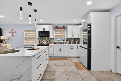 Beautifully remodeled 4-bedroom, 3-bathroom home featuring two - photo 15