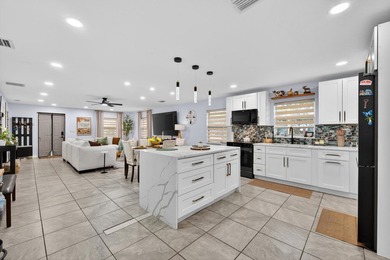 Beautifully remodeled 4-bedroom, 3-bathroom home featuring two - photo 16