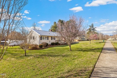 Charming, fully updated bungalow on just under 1/2 acre --